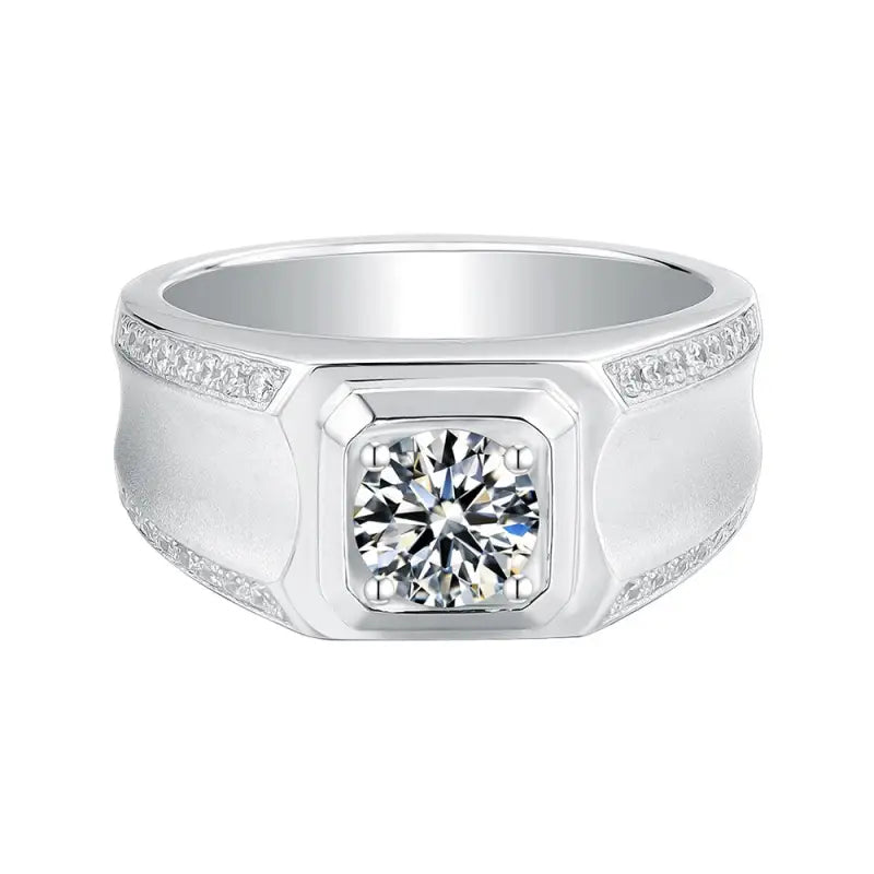 Silver men’s ring with a prominent round diamond centerpiece and smaller diamonds along the band.