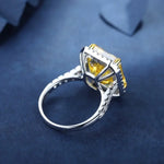 Load image into Gallery viewer, Silver ring with a square yellow gemstone surrounded by smaller white stones.
