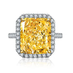 Load image into Gallery viewer, Dazzling yellow diamond ring surrounded by smaller white diamonds.
