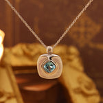 Load image into Gallery viewer, Cushion Blue Topaz &amp; Nacre Pendant Necklace
