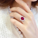 Load image into Gallery viewer, 1 Ct Oval Cut Lab Ruby Cluster Engagement Ring
