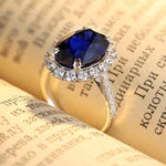 Load image into Gallery viewer, 8.5 Ct Oval Cut Lab Blue Sapphire Halo Engagement Ring
