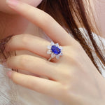 Load image into Gallery viewer, Sunny Heart Halo 4 Ct Lab Blue Sapphire Engagement Ring
