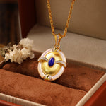 Load image into Gallery viewer, Brushed Gold &amp; Nacre  Filled Oval Lapis Lazuli &amp; CZ Pendant Necklace
