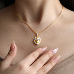 Load image into Gallery viewer, Brushed Gold &amp; Nacre  Filled Oval Lapis Lazuli &amp; CZ Pendant Necklace
