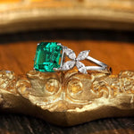 Load image into Gallery viewer, Emerald and diamond ring set in white gold or platinum.
