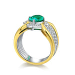 Load image into Gallery viewer, Two-tone gold and silver ring featuring a prominent emerald-cut green gemstone and diamond accents.
