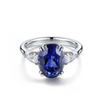 Load image into Gallery viewer, Sapphire and diamond engagement ring with a silver band.
