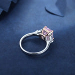 Load image into Gallery viewer, Silver ring with a square-cut pink gemstone in a prong setting.
