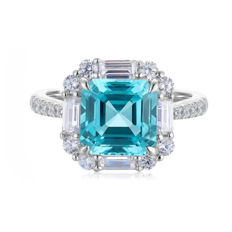 Stunning aquamarine gemstone ring with diamond accents set in white gold or platinum.