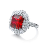 Load image into Gallery viewer, Ornate ring featuring a square-cut ruby surrounded by diamonds.
