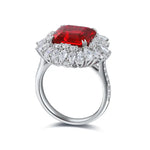 Load image into Gallery viewer, Ornate silver ring featuring a prominent square-cut red gemstone surrounded by smaller clear diamonds.
