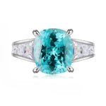 Load image into Gallery viewer, Stunning aquamarine gemstone ring with diamond accents set in a silver-toned band.
