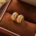 Load image into Gallery viewer, Crescent Brushed Gold  Filled with Round CZ Huggie Earrings
