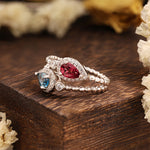 Load image into Gallery viewer, Pear Cut Blue Topaz &amp; Garnet Toi Et Moi Ring
