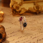 Load image into Gallery viewer, Pear Cut Blue Topaz &amp; Garnet Toi Et Moi Ring
