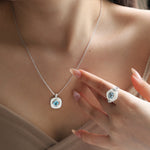 Load image into Gallery viewer, Cushion Blue Topaz &amp; Nacre Pendant Necklace
