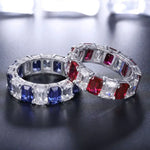 Load image into Gallery viewer, Two gemstone-encrusted eternity bands featuring alternating colored and clear stones.
