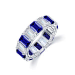 Load image into Gallery viewer, Elegant ring featuring alternating emerald-cut sapphires and diamonds in a band setting.
