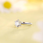 Load image into Gallery viewer, Diamond solitaire engagement ring with a six-prong setting on a silver band.
