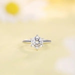 Load image into Gallery viewer, Diamond solitaire engagement ring with a round brilliant cut stone.
