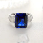 Load image into Gallery viewer, Luxury Triple Split Shank 13 Ct Emerald Cut Lab Blue Sapphire Engagement Ring - Engagement Ring
