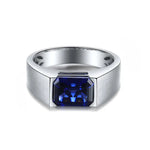 Load image into Gallery viewer, Silver ring with a rectangular deep blue gemstone set in the center.
