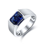 Load image into Gallery viewer, Silver ring with a square-cut deep blue gemstone.
