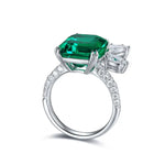 Load image into Gallery viewer, Emerald and diamond ring with a silver band.
