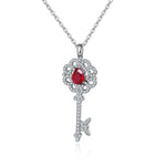 Load image into Gallery viewer, Pear Cut Lab Ruby Pave Key Pendant Necklace - Necklace &amp; Pendant
