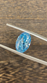 Load and play video in Gallery viewer, 3.468 Ct Oval Cut Fancy Blue Lab Diamond VS1
