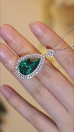 Load and play video in Gallery viewer, Pear Cut Columbia Green Lab Emerald Cluster Pendant Necklace
