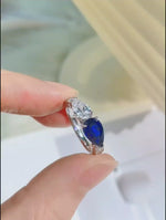 Load and play video in Gallery viewer, Toi Et Moi Pear Cut Lab Blue Sapphire &amp; Lab Diamond Engagement Ring
