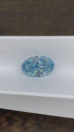 Load and play video in Gallery viewer, 5.031 Ct Oval Cut Fancy Blue Lab Diamond VS
