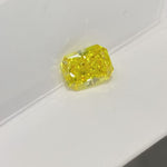 Load and play video in Gallery viewer, Radiant Cut 1.525 Ct Fancy Yellow Lab Diamond VS Clarity
