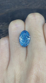 Load and play video in Gallery viewer, 4.312 Ct Oval Cut Fancy Blue Lab Diamond VS
