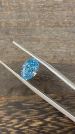 Load and play video in Gallery viewer, 1.939 Ct Oval Cut Fancy Blue Lab Diamond VS
