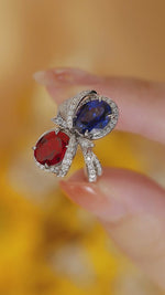 Load and play video in Gallery viewer, Bowknot 5.3 Ctw Oval Lab Ruby &amp; Lab Blue Sapphire Toi Et Moi Engagement Ring
