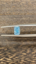 Load and play video in Gallery viewer, 0.936 Ct Radiant Cut Fancy Blue Lab Diamond VS1
