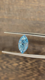 Load and play video in Gallery viewer, 1.709 Ct Marquise Cut Fancy Blue Lab Diamond VS
