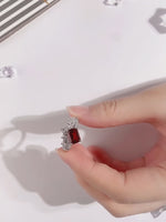 Load and play video in Gallery viewer, Split Shank 2 Ct Emerald Cut Lab Ruby Engagement Ring
