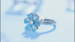 Load and play video in Gallery viewer, Daisy Pear Cut Blue Moissanite Engagement Ring
