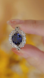 Charger et lire la vidéo dans la visionneuse de galerie, Bague de fiançailles avec saphir bleu de laboratoire de 4,8 ct et bande torsadée
