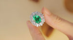 Load and play video in Gallery viewer, 4 Ct Oval Cut Lab Emerald Cluster Engagement Ring
