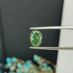 Load and play video in Gallery viewer, IGI Certified Oval Cut 1.54 Ct Fancy Intense Green Lab Diamond VS1 Clarity
