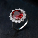 Load image into Gallery viewer, Ruby and diamond ring with a silver band.
