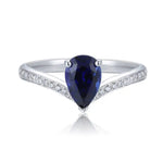 Load image into Gallery viewer, Sapphire and diamond engagement ring with a pear-shaped center stone.
